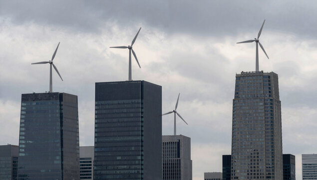 Futuristic city skyline with corner-mounted vertical-axis wind turbines spinning atop glass towers under dramatic high-altitude clouds