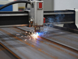 CNC plasma cutting in action: blue arc carving through a rusted iron plate with sparks and smoke