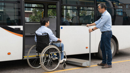 Obraz premium Professional photograph of a wheelchair user boarding a high-floor bus with a built-in lift and a helpful driver