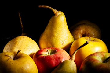 yellow pear fruit mix on black background