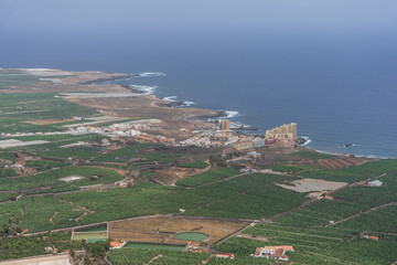View of Los Silos coastline amid banana plantations from Camino Real las Arenas local road, Tenerife, Canary Islands, Spain.