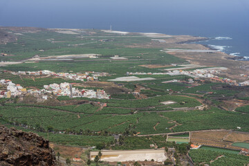 View of Los Silos coastline amid banana plantations from Camino Real las Arenas local road, Tenerife, Canary Islands, Spain.