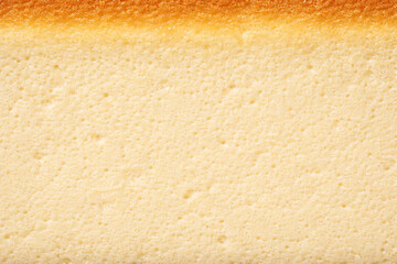 Baked cheesecake crumb macro texture background