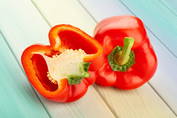 sliced bell pepper on wood background