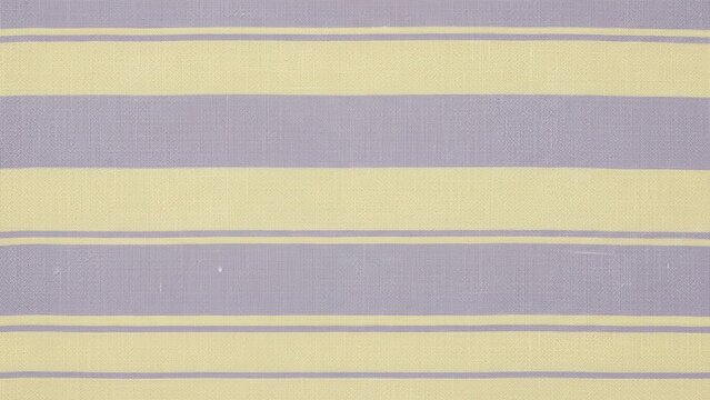 Textured background of linen fabric dyed in a subtle stripe pattern using lavender and soft yellow.