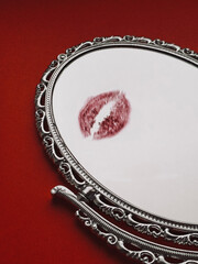 Kiss on the mirror. Valentine`s Day still life aesthetic