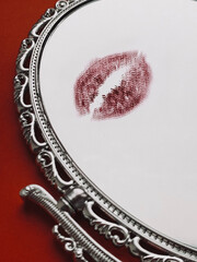 Kiss on the mirror. Valentine`s Day still life aesthetic