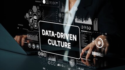 Business Professional Engaging with Data-Driven Culture Concept Displayed on Screen for Innovation and Analytics in Modern Workplace. Asymptotic smart data analytic.