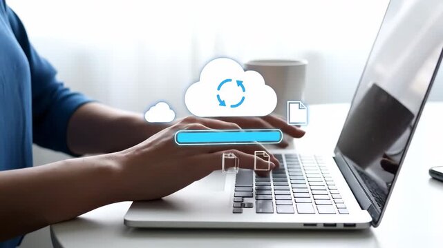 Hands typing on a laptop with a cloud upload progress bar animation.