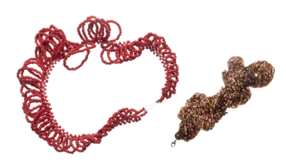 Colorful Tribal bead style necklet fly in air. Red color bead necklace as gemstone for fashion ornament decorative items. Fashion ornament necklace to add more style. White background isolated