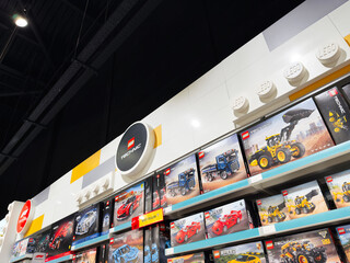 Fototapeta premium Manchester Lego Technic display in store with colorful boxes and large Lego rounds