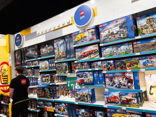 Obraz premium Shoppers in a LEGO store in Manchester, UK browsing city themed sets and displays today