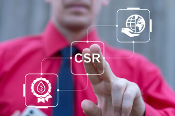 Business person using virtual touch screen presses the text CSR. CSR Corporate Social Responsibility Sustainability or Sustainable Development concept.