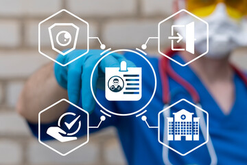 Doctor using virtual touch screen presses icon of medical id card symbolizing: medicine employees identification and clinic access. Identification ID card health care concept. Hospital security.