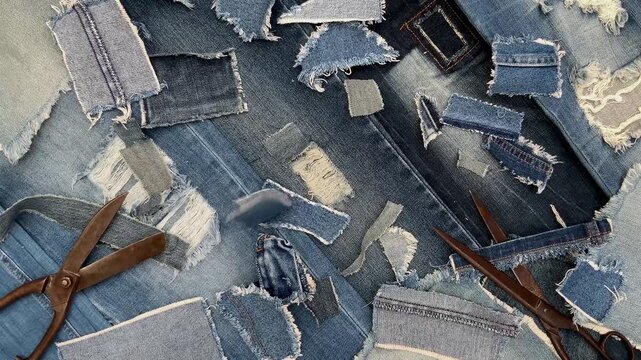 Denim Fabric Scraps with Vintage Scissors for Sustainable Fashion Background
