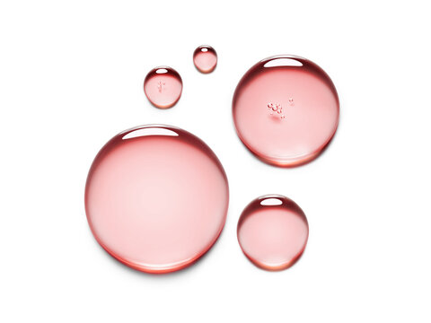 Variation of pink clear serum oil round sample swatch textures with bubbles isolated on white background. Skin care cosmetic hyaluronic acid retinol collagen water science lab product