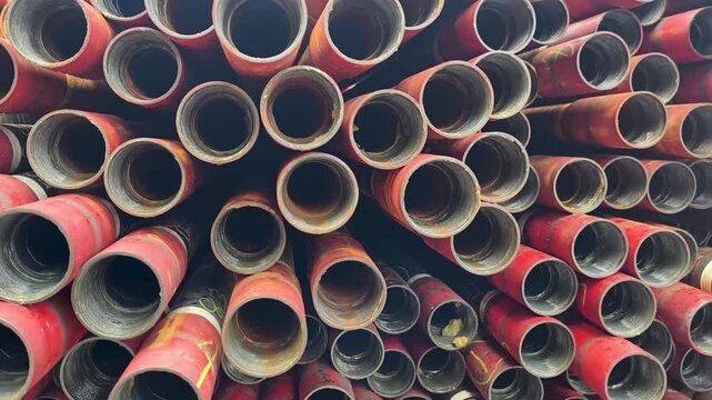 Stack of oilfield tubing taking at pin end connection for oil and gas well completion (exploration and production industry)
