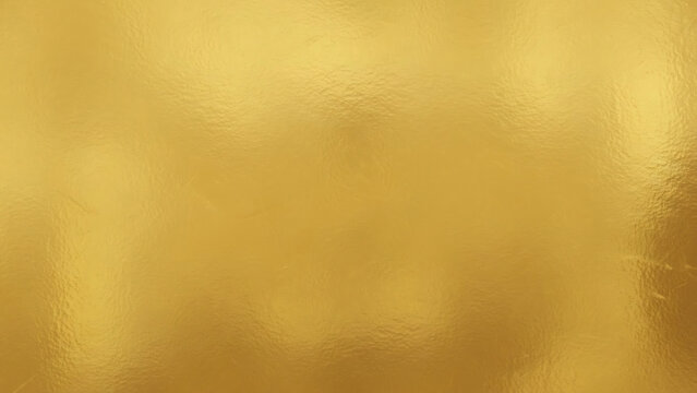 Abstract golden texture: shimmering gold background with subtle light reflection