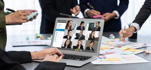 Analyst team use sticky note for creative and analytic brainstorm for business idea with BI data dashboard on laptop screen. Analysis financial data visualization tech for marketing strategy. Prodigy