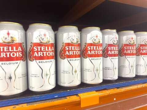 BELO HORIZONTE, MG/BRAZIL, JANUARY, 06, 2026: A row of Stella Artois beer cans on a shelf in a store