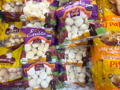 BELO HORIZONTE, MG/BRAZIL, JANUARY, 06, 2026: A colorful display of packaged cheese bread in a grocery store