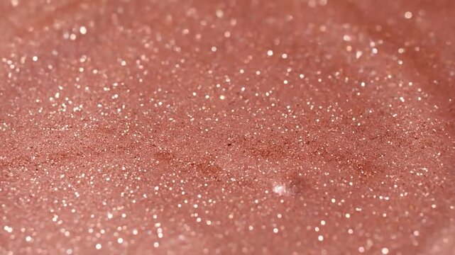 Shimmering rose gold texture with soft light highlights