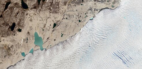 Satellite view of Greenland Arctic landscape with melting glaciers and rocky tundra