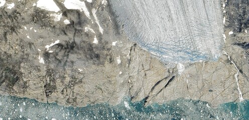 Satellite view of Greenland Arctic landscape with melting glaciers and rocky tundra
