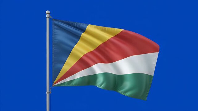 Seychelles flag waving gracefully in the wind against a blue screen background, showcasing national pride and identity in a dynamic display