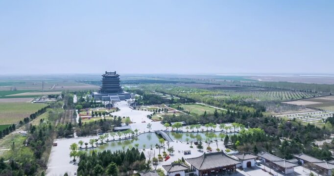 Directional aerial time-lapse of the Tang-style Guanque Tower in Shanxi, famous from Wang Zhihuan&rsquo;s iconic poem overlooking the Yellow River, China.