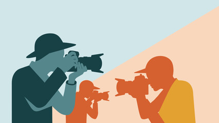 Photographers at work with cameras capturing moments.