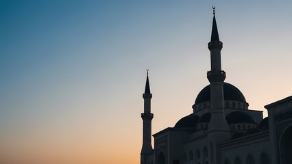 Fototapeta premium Serene Mosque Silhouette during Ramadan Twilight with Majestic Dome and Minaret