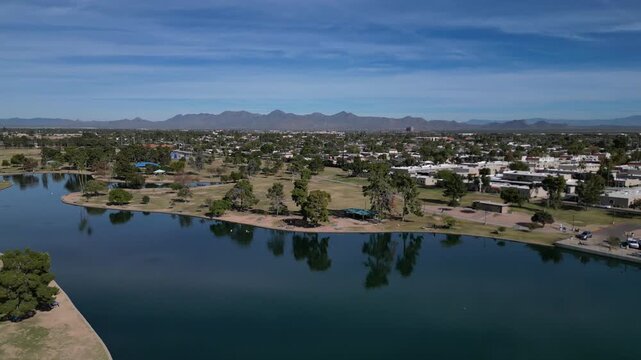 chaparral park scottsdale arizona aerial view palm trees lake (phenix az southwest travel mountains view background) south mountain southwest travel reflection pond water beauty nature hike urban walk