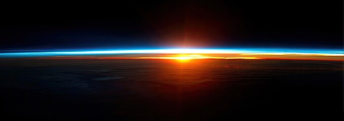 Fototapeta premium Earth's horizon with rising sun and blue atmosphere seen from space