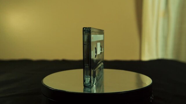 Vintage transparent cassette tape standing upright indoors