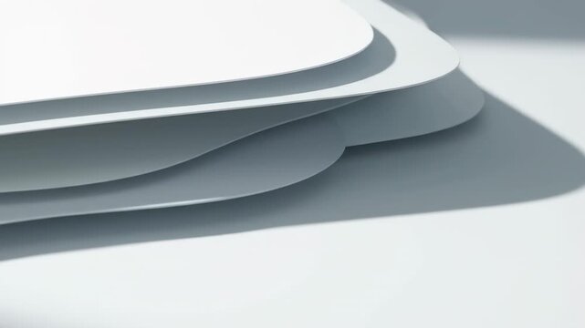 Layered paper shapes casting moving shadows with abstract minimal motion for creative textured background