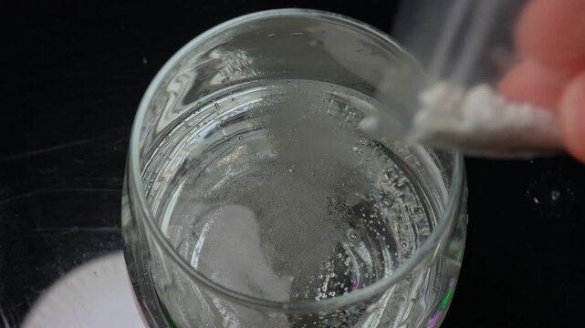 Drink spiking for date rape drug. Recreational drugs like Ecstasy, Lysergic Acid Diethylamide or LSD, Ketamine and party-drugs dropped into beverages.