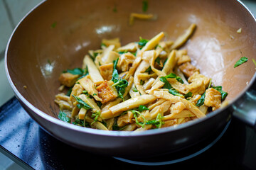 Vegetarian stir-fry with tofu, bamboo shoots, and leafy greens