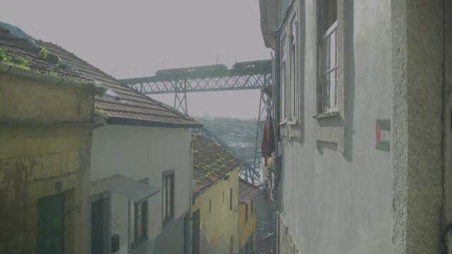 Dom Luis I Bridge with Serra do Pilar visible in the background in Porto.