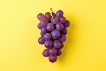 Fototapeta premium Purple grapes yellow fruit plant.