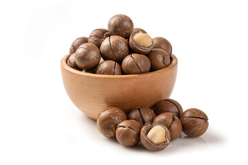 Macadamia nuts in shells and cracked open, served in a rustic wooden bowl. Isolated on a white background, perfect for healthy snack branding and organic food catalogs.