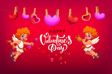 Naklejka premium Happy Valentine day greeting card with cherubs and hearts hanging on clothesline. Vector holiday banner with cheerful flying cupid characters and heart shaped decorations celebrating love and romance