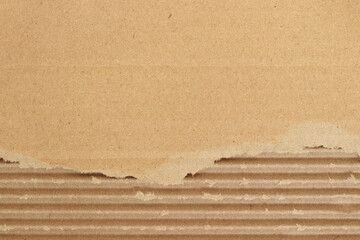 Brown cardboard sheet abstract background, texture of recycle paper box in old vintage pattern with ripped edges.