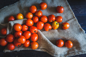 Fresh tomato on the old wood, ripe and healthy fruit