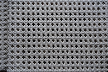 Woven with plastic texture background looks like woven bamboo. The texture of of white plastic