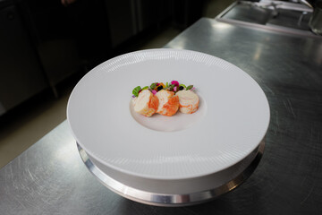 Exquisite Dish Presentation: A culinary masterpiece on a white plate, showcasing a refined dining experience.