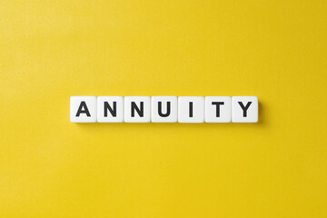 the word annuity is written on dice