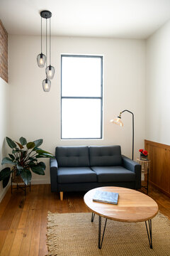 Modern small apartment living room with window - horizontal