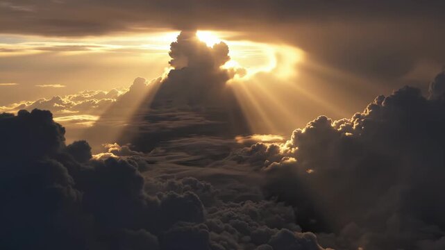Dramatic sun rays breaking through clouds in sky for inspirational cinematic background