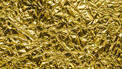 Luxury shiny metallic golden foil crumpled texture background